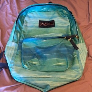 Teal and green jansport backpack